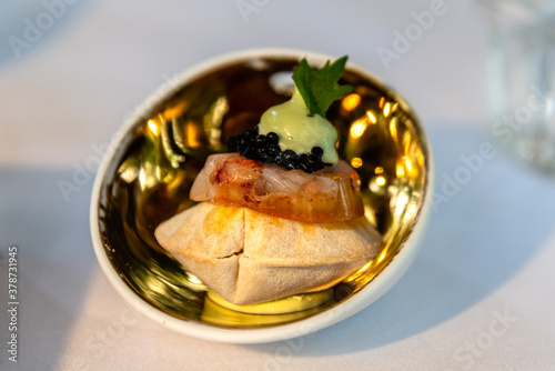Fototapeta Naklejka Na Ścianę i Meble -  Beautiful decorated dish of international fusion cuisine