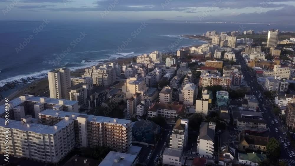 High Rise Residential and Hotels sit tall, close to the ocean during a late evening, sea point, cape town, SA Drone Aerial High Rise Residential and Hotels sit tall, close to the ocean during a late evening, sea point, cape town, SA Drone Aerial
