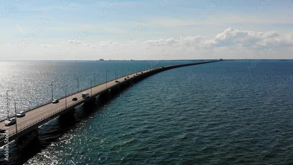 Forward aerial of Oland Bridge crossing Kalmar Strait on perfect clear sunny day Forward aerial of Oland Bridge crossing Kalmar Strait on perfect clear sunny day