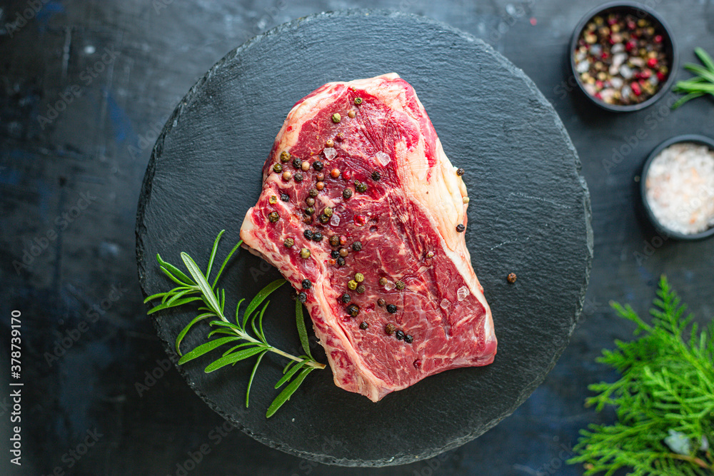 fresh raw steak rib eye meat beef juicy on the table serving size top view copy space for text food background rustic