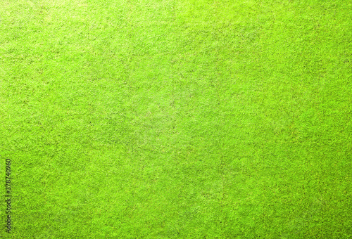 Green grass texture pattern background., Top view of grass garden Ideal concept used for design. Detailed green grass lawn texture seen from above. © SappawatS