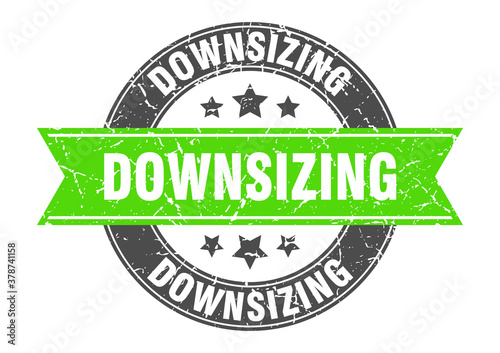 downsizing round stamp with ribbon. label sign