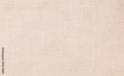 Close up beige linen fabric texture background