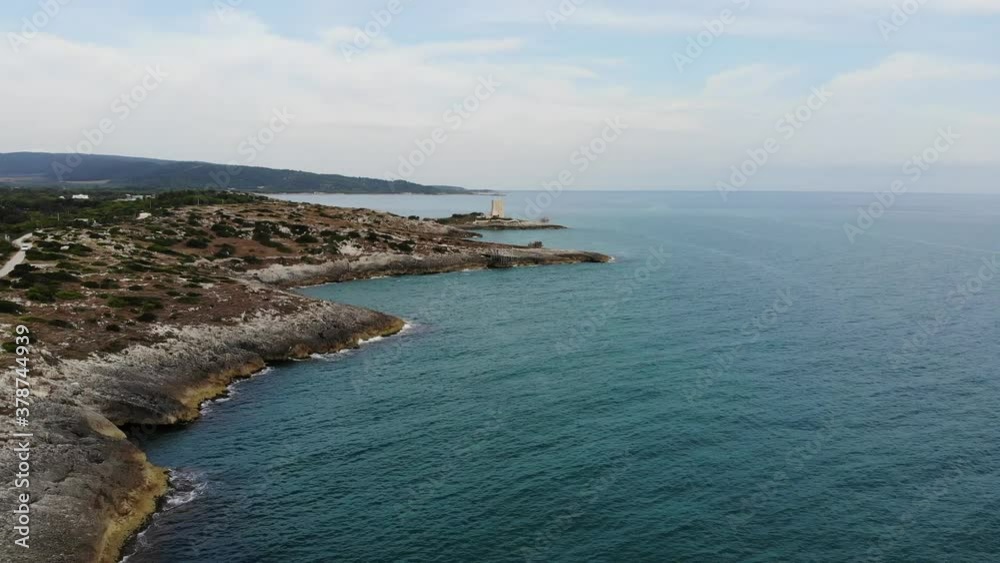 Drone flies over Gargano coast near Vieste city during a sunny summer morning Drone flies over Gargano coast near Vieste city during a sunny summer morning