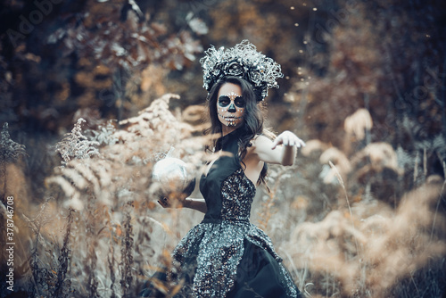 Fotografie Closeup portrait of Calavera Catrina in black dress