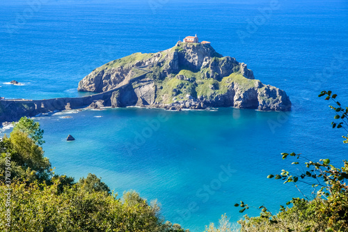 Doniene Gaztelugatxeko hermitage on top of Gaztelugatxe island and . Biscay  Basque Country  Spain.