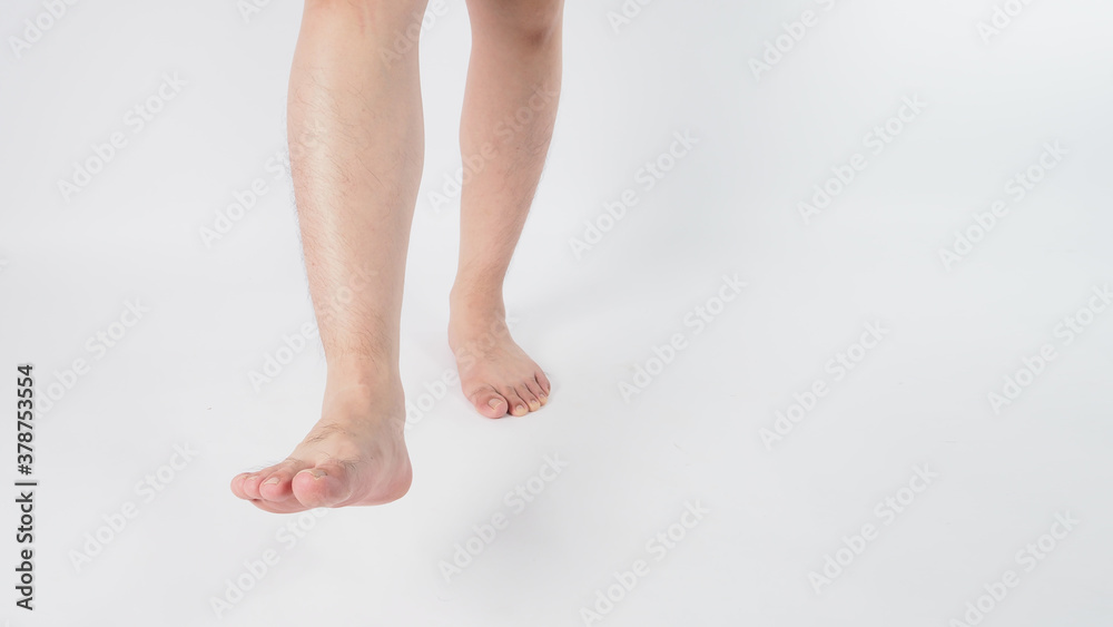 Male legs and barefoot is isolated on white background.