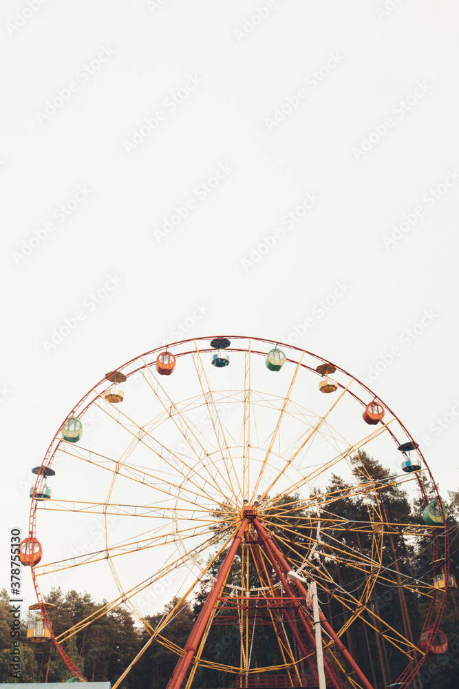 Urban geometry, modern architecture, Abstract and Inspirational architectural design. Ferris wheel in an amusement Park.