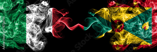 Italy vs Grenada smoky mystic flags placed side by side. Thick colored silky abstract smoke flags of Italian and Grenada