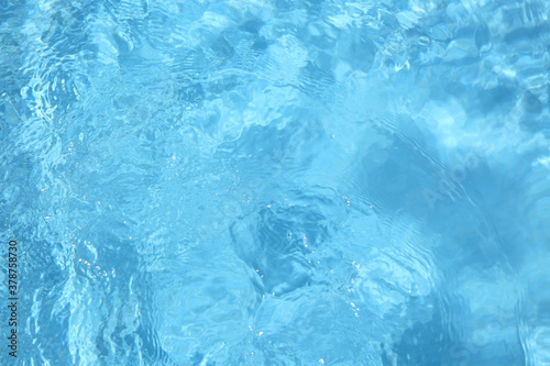 Swimming pool with clear water as background, closeup