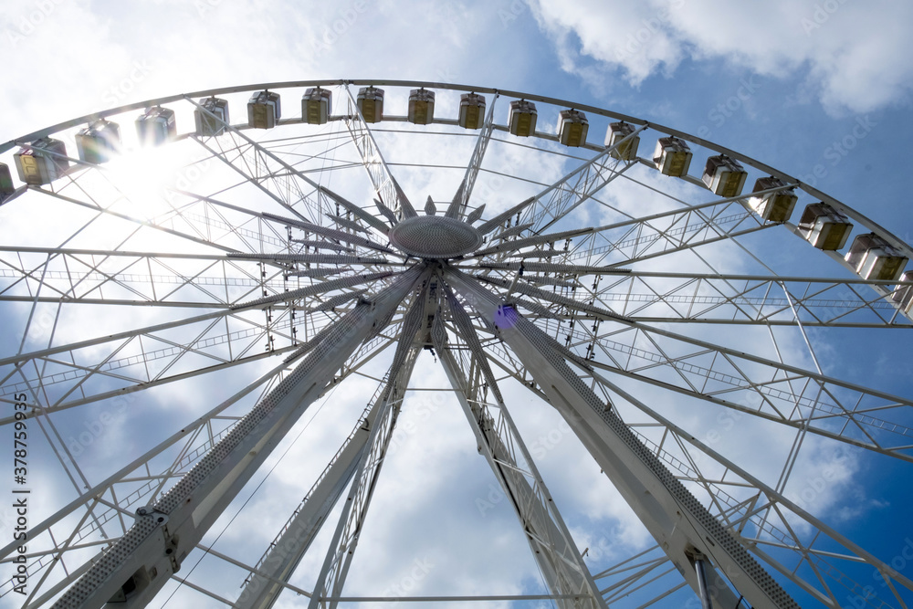 A giant panoramic Ferris wheel with a great cityscape in the center of Budapest, Hungary A giant panoramic Ferris wheel with a great cityscape in the center of Budapest, Hungary