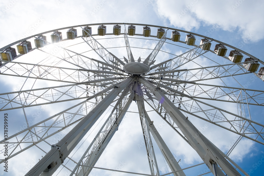 A giant panoramic Ferris wheel with a great cityscape in the center of Budapest, Hungary A giant panoramic Ferris wheel with a great cityscape in the center of Budapest, Hungary
