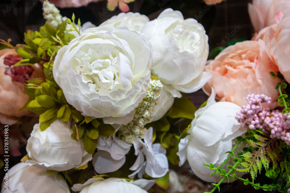 Beautiful multicolored artificial flowers background Beautiful multicolored artificial flowers background