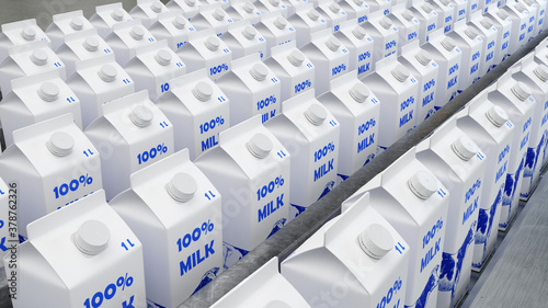 Milk in packaging on assembly line in modern dairy photo
