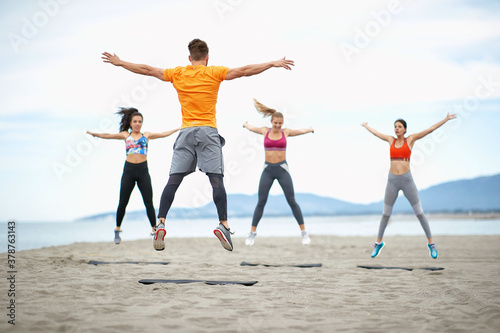 Fototapeta Naklejka Na Ścianę i Meble -  Fitness training on the beach