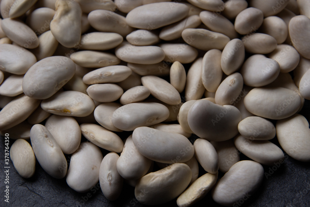 Natural white bean closeup background.