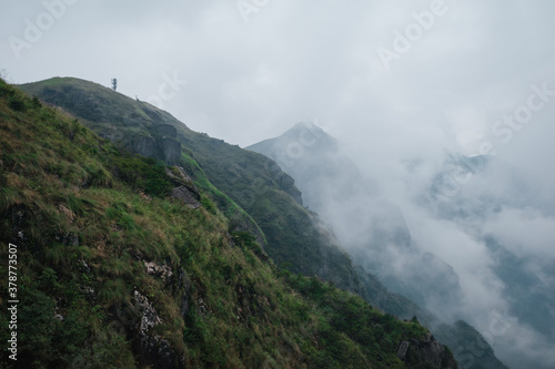 Mountain landscape covered in clouds and fog on Wugong Mountain in Jiangxi, China