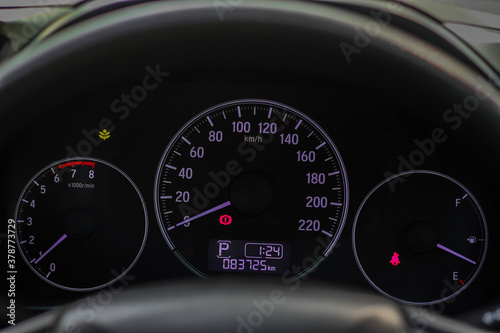 car​ instrument panel, car​ speen  motor of​ night, car​ dashboard​ modern​ automobile control​illuminated  panel​ speed display. photo