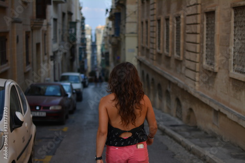 young woman walking in MALTA
