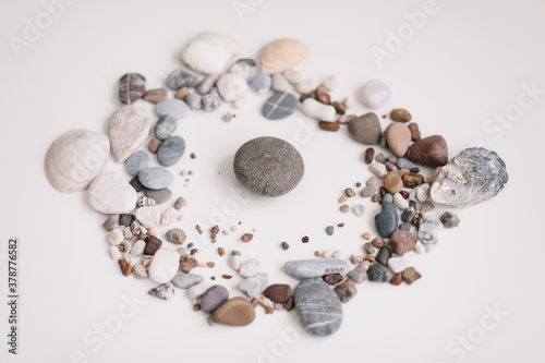 Soap with seashells and stones on white background. Spa or wellness setting. minimal concept. top view mockup