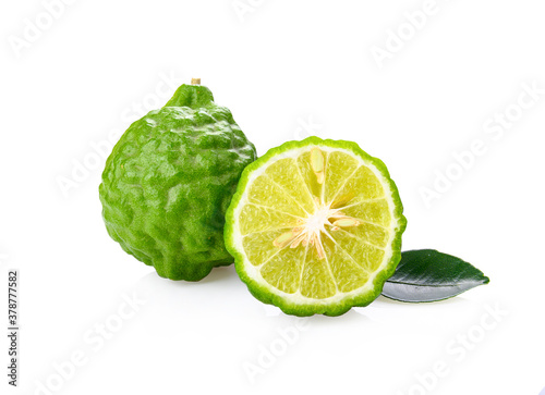  Kaffir lime with leaves on white background