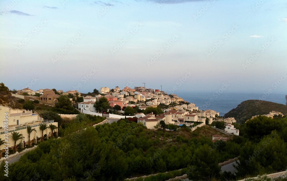 view of the town on the hill by the sea