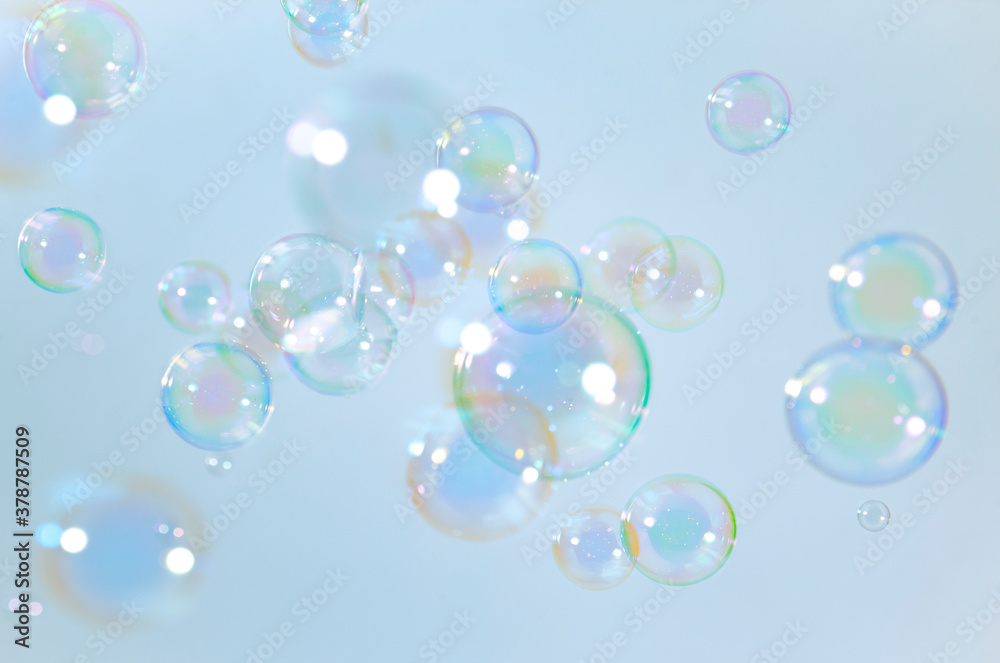 Freshness natural summer background. Soap bar, Beautiful colorfull soap bubbles floating in the air.