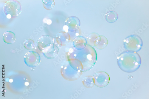 Freshness natural summer background. Soap bar  Beautiful colorfull soap bubbles floating in the air.