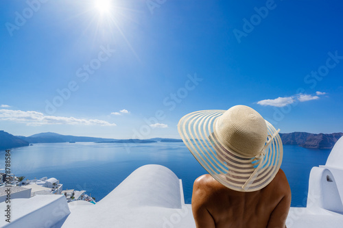Woman on holidays in Santorini island © Netfalls