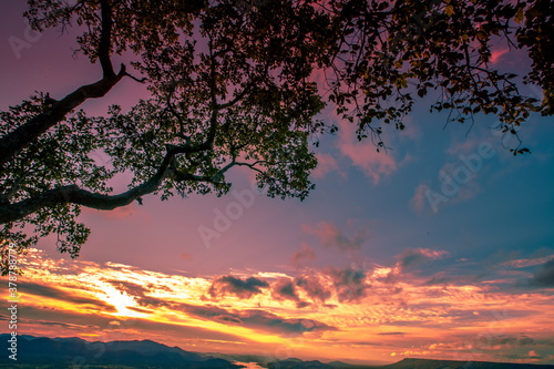 Natural panoramic lakeside nature background, beautiful twilight sunset, blurred meadow wind. Cool weather in the viewpoint or tourist attraction © bangprik
