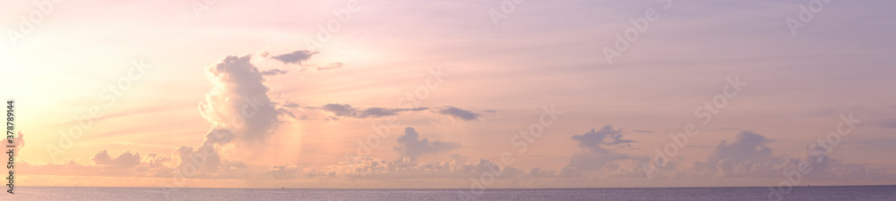 Panorama view of sunrise on beach