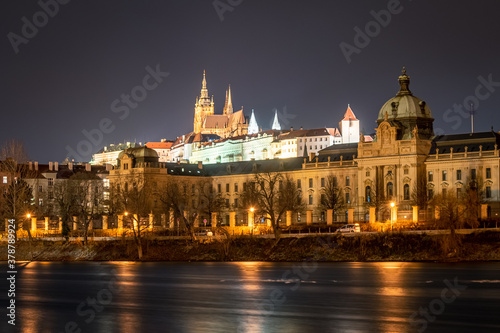 two most important buildings in Prague over Vltava river. Strakova Akademie in foreground is the seat of the Government of the Czech Republic, Prague Castle in background is the seat of the president