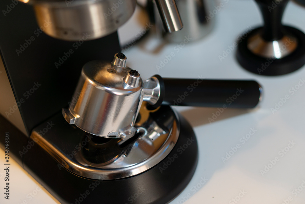 Professional coffee machine making espresso in a cafe Professional coffee machine making espresso in a cafe