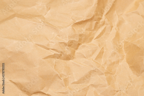 Crumpled paper texture. Macro shot. Selective focus.