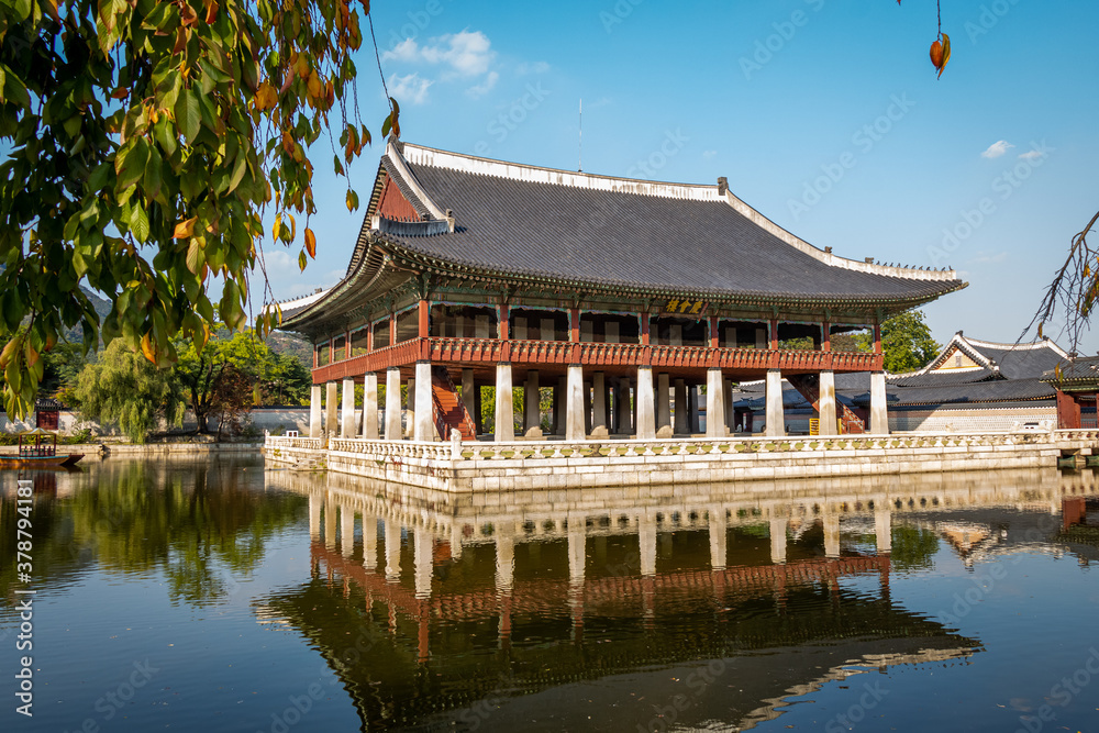 A Korean shrine reflecting on a lake at Gyeongbokgung Palace