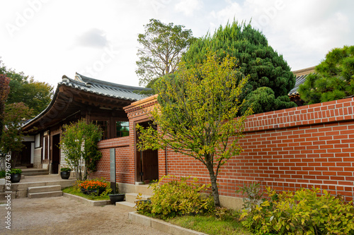 Photography Korean Architecture on a street in Bukchon Hanok Village in Seoul, South Korea