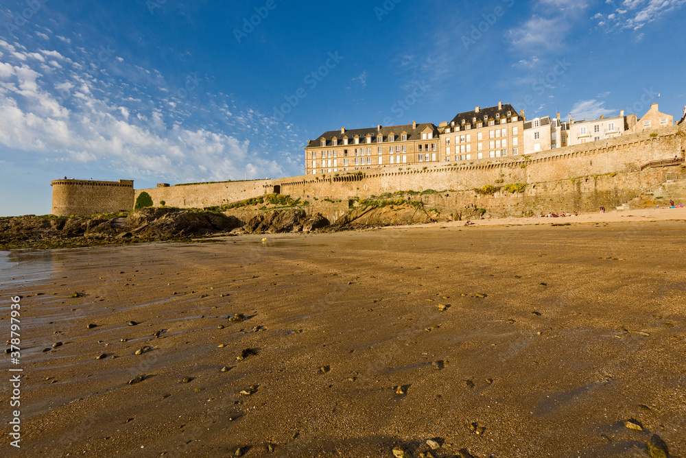 Waterfront view of beach townhouses and skyline, Saint-Malo, Brittany, France
