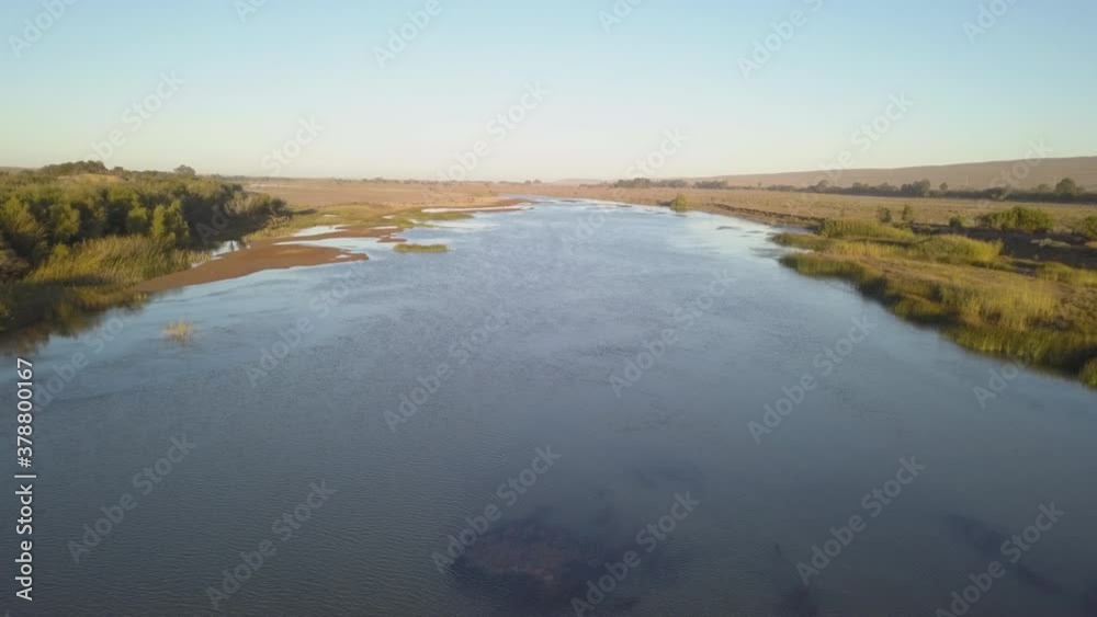 Aerial of a wide river in the desert Aerial of a wide river in the desert