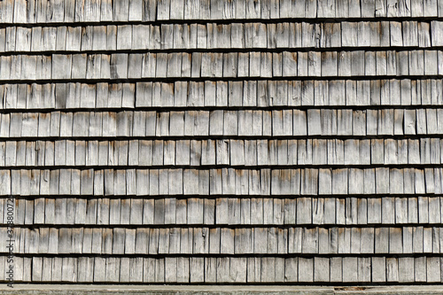 Obraz na płótnie The wooden wall of the building. The pattern of wooden wall. w salonie