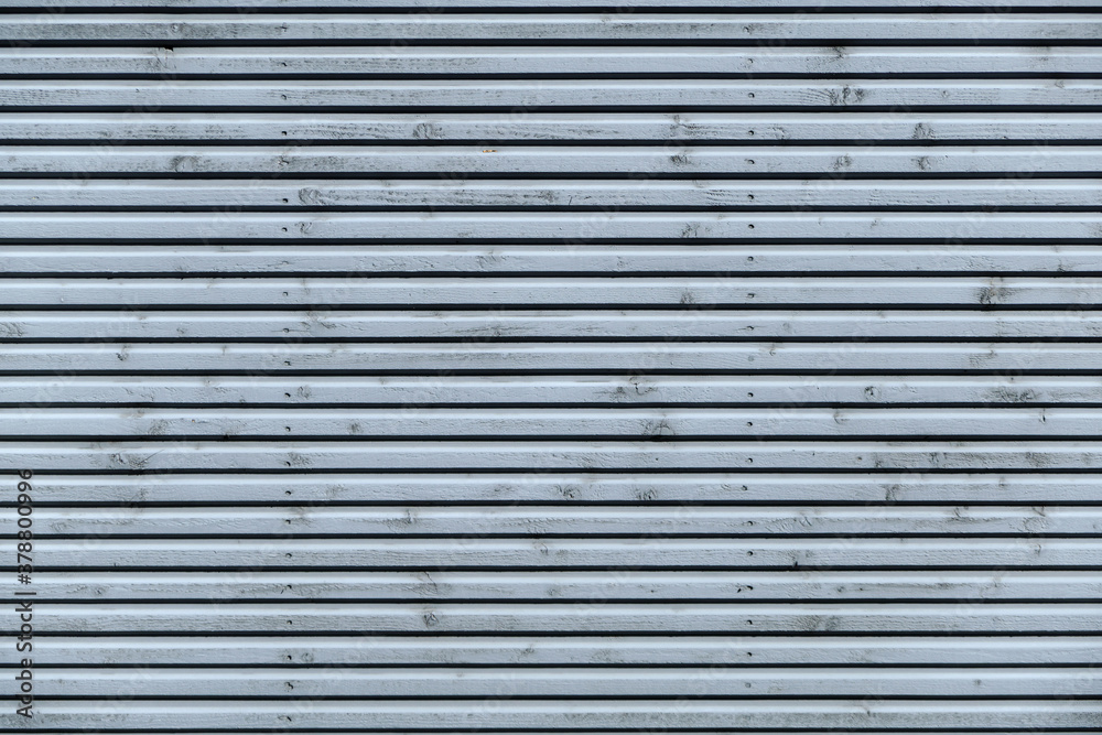 The modern wooden wall of the building.