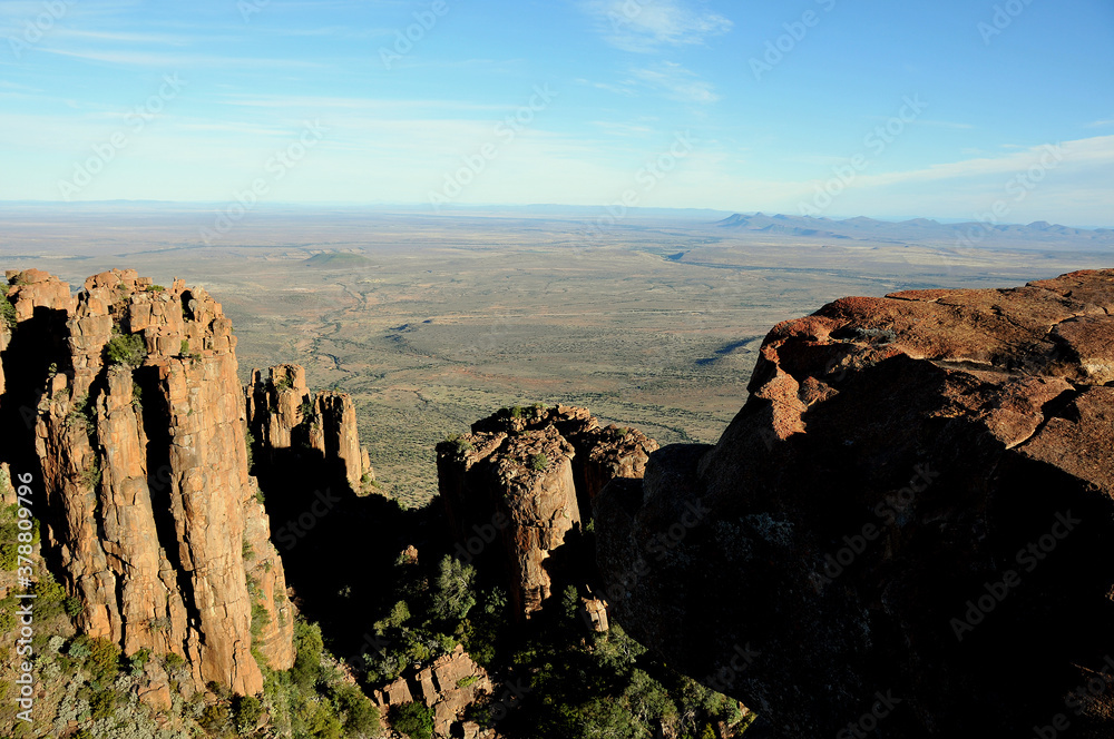 An endless view into the Karoo over the rock formations of the Valley Of Desolation