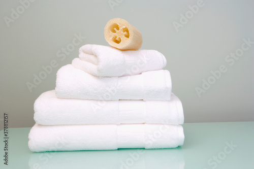 Bath sponge on towels photo