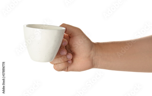 Woman holding cup on white background, closeup