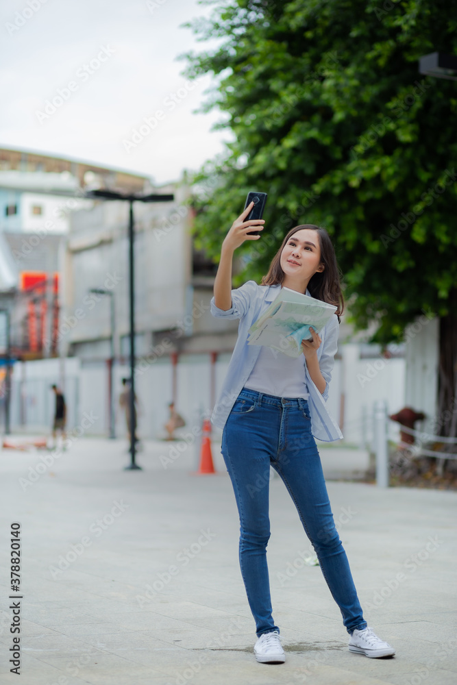 Beautiful asian woman take selfie by smartphone. Beautiful asian woman take selfie by smartphone.
