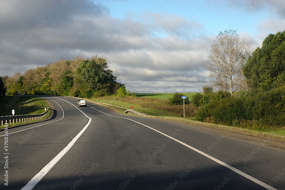 Fototapeta premium road landscape on a clear autumn morning