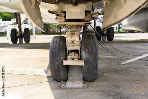 Close up of airplane wheel in an airfield
