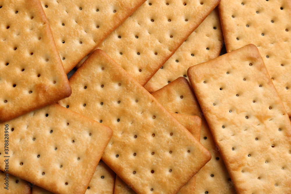 Many delicious crackers as background, top view Many delicious crackers as background, top view
