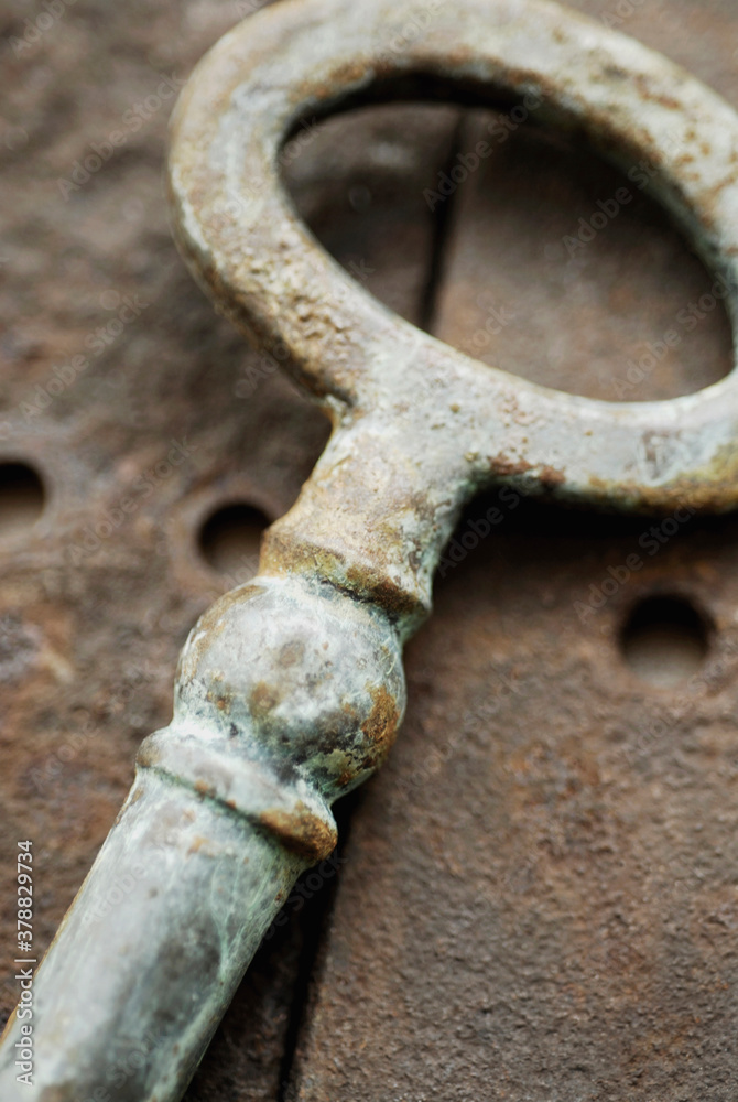 Close-up of an antique rusty key