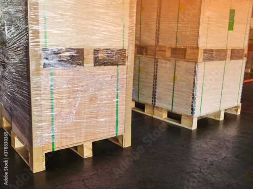 Shipment cartons box on pallets and wooden case on forklift in interior warehouse cargo for export and sorting goods in freight logistics and transportation industrial, delivery 