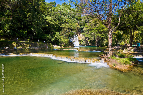 Waterfall in a forest, Tamasopo Waterfalls, Tamasopo, San luis Potosi, Mexico photo